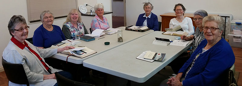 a Group of Ladies Meeting for a bible study